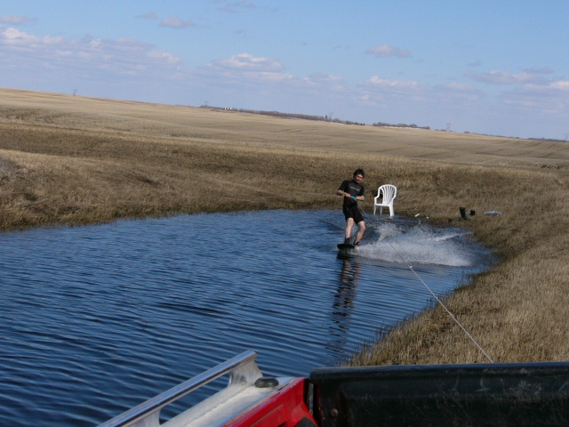 SASKATCHEWAN WAKEBOARDING BEHIND PICKUP 1
