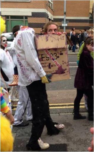 headless man carry head boxjpg