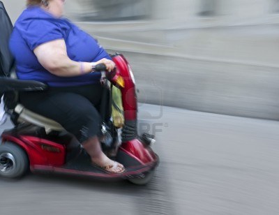 obese-person-on-a-electric-wheelchair